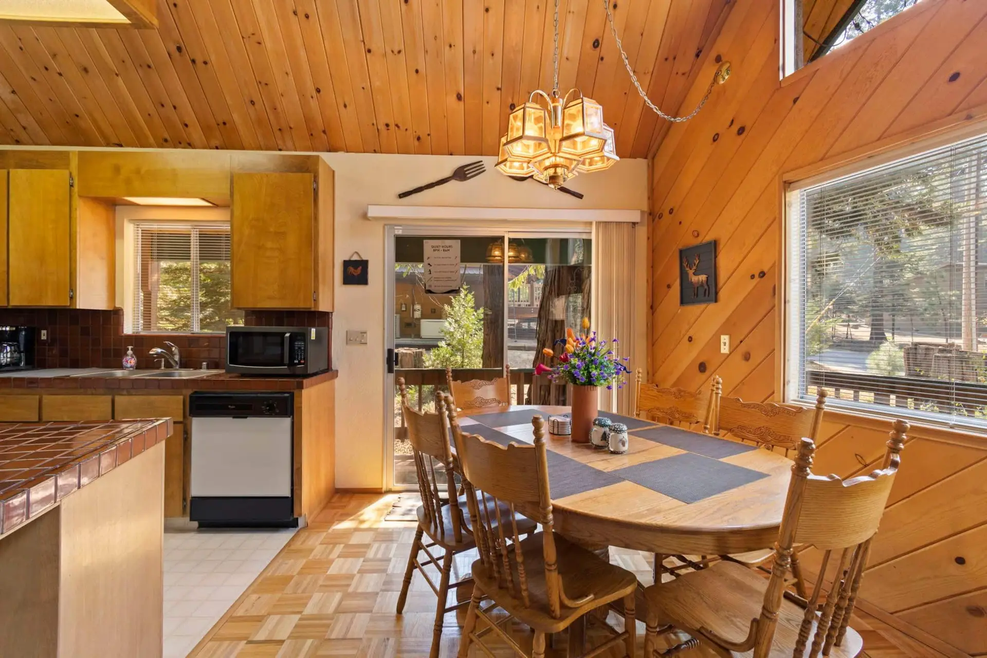 Kitchen and dining table under the pine ceiling, Knotty Pine Chalet