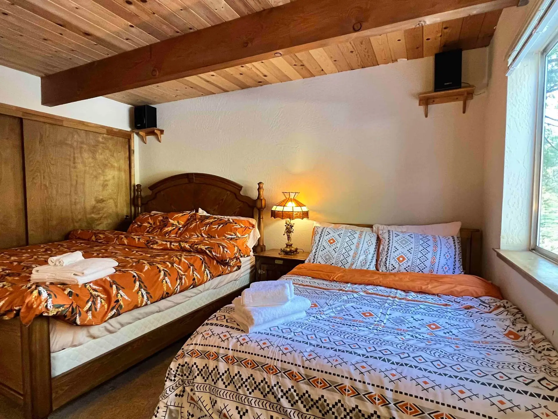 Bedroom with a king bed and a queen bed, Knotty Pine Chalet