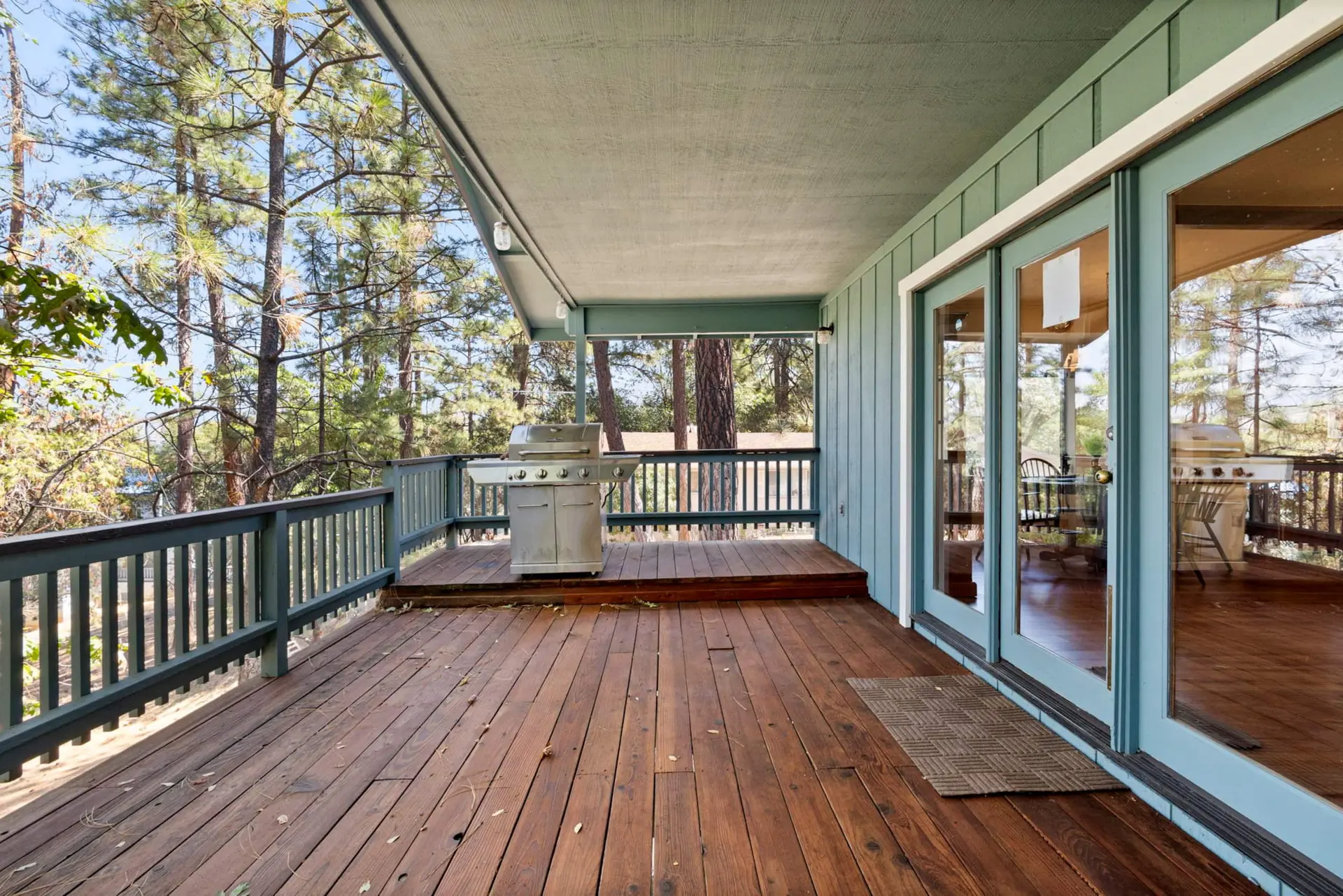 Covered deck along the back of the cabin, Pine Mountain Lake Cabin